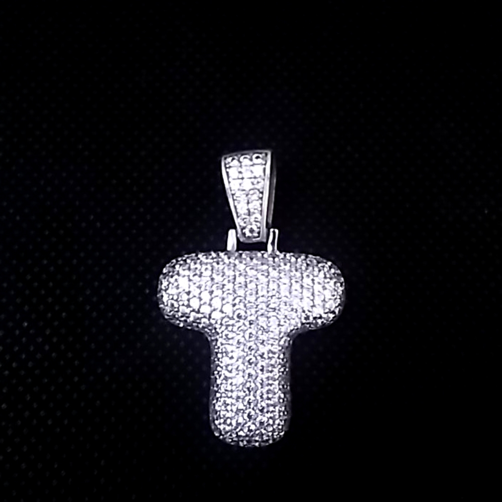 This is a Charm the letter " T "